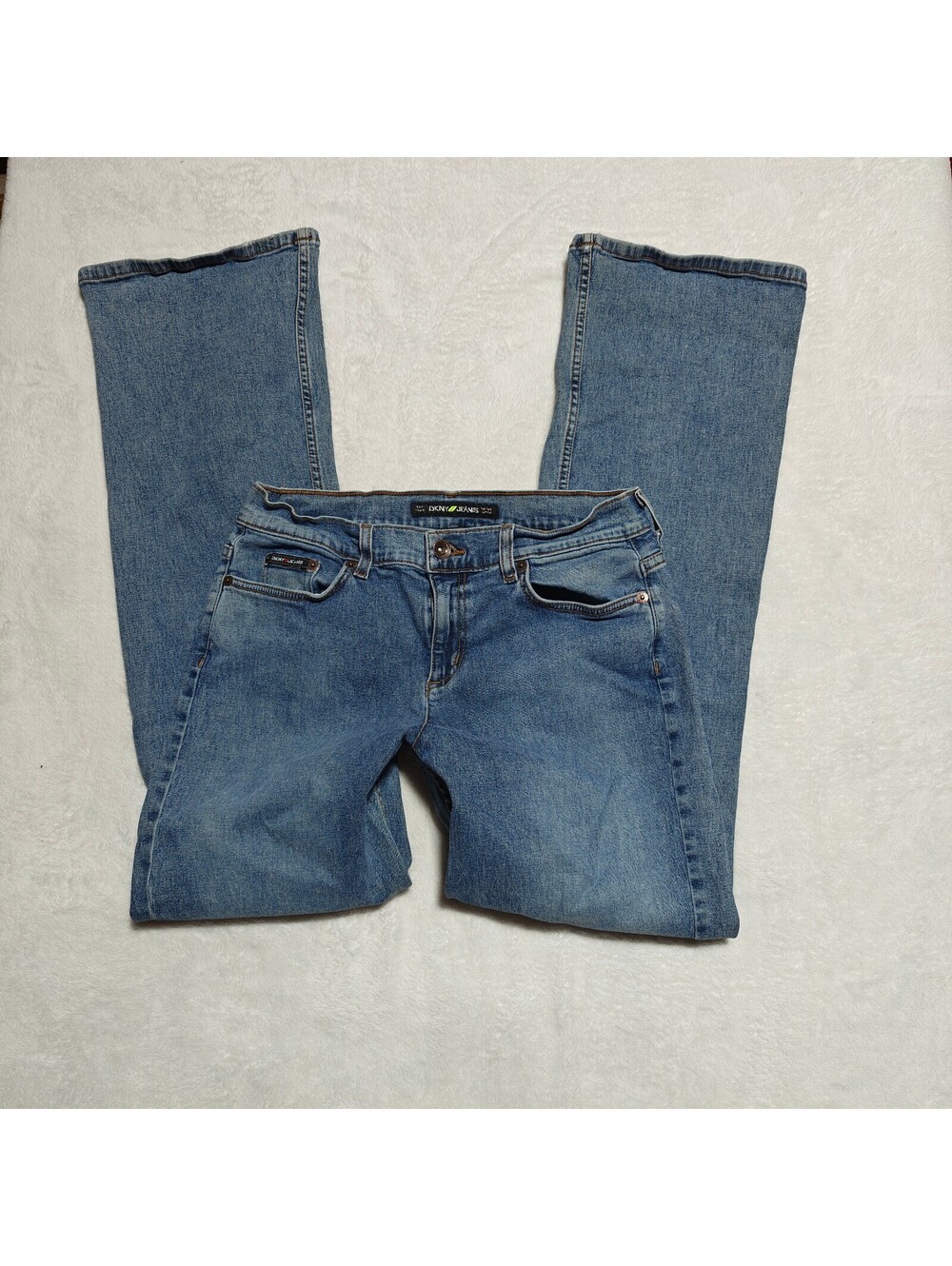 DKNY Y2K medium wash midrise bootcut jeans